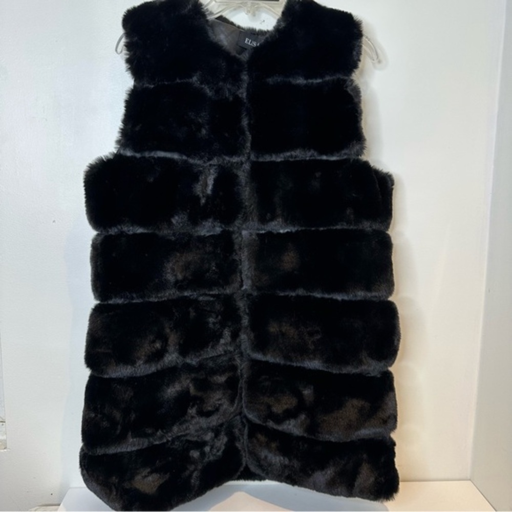 Elisa’s faux fur vest